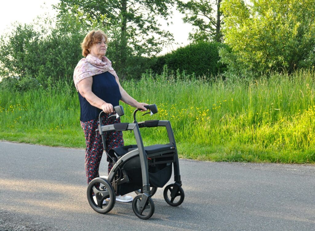Old Lady using a Rollator Walker