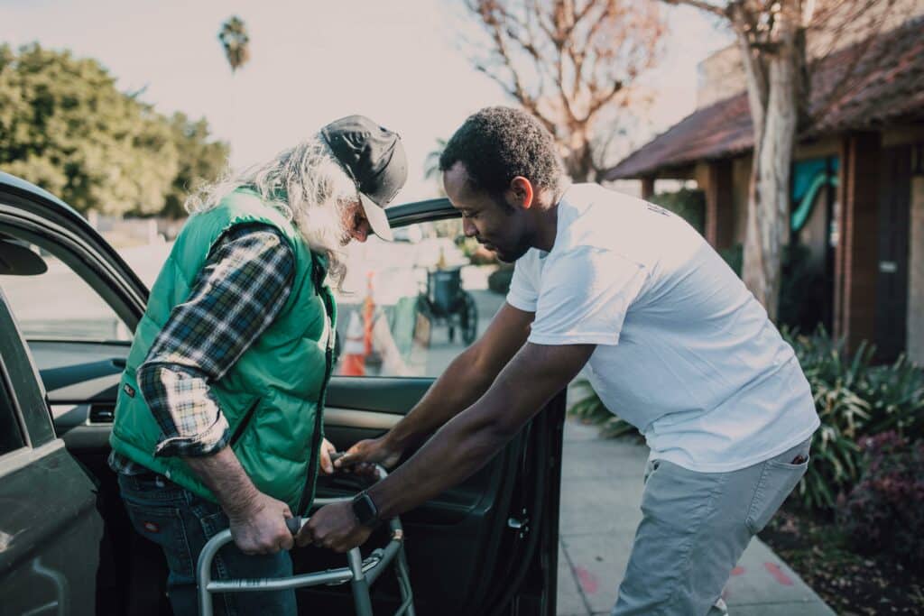 Old Man Using A Walker